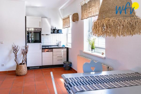 Ferienhaus am Gutspark Drankse Ferienwohnung Sonnenmeer, Dranske